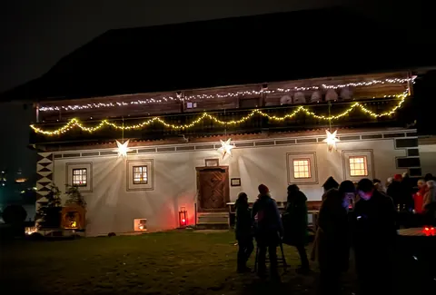 The Eggerhaus lit up with fairy lights in the evening